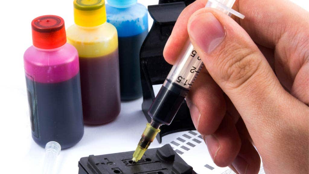 photo of printer dye being refilled