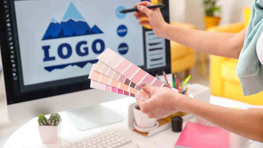 Person designing stickers and logos