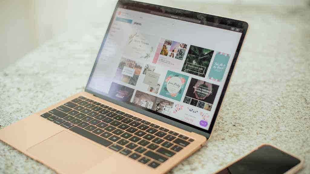 Laptop showing online graphic design platform
