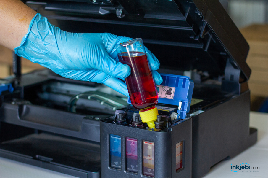 Person Refilling Printer Ink Cartridges