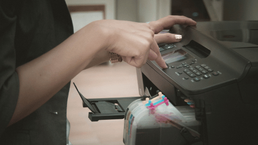 person using an Epson printer