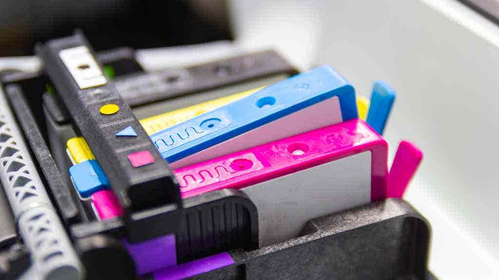 Close up photo of ink cartridges inside a printer