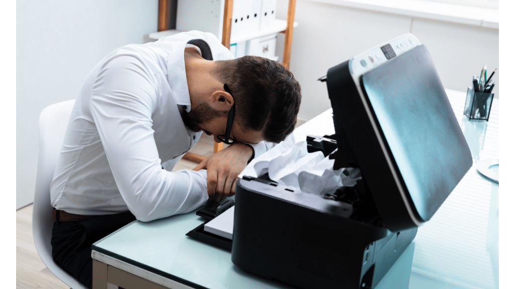 man laying his head on the table