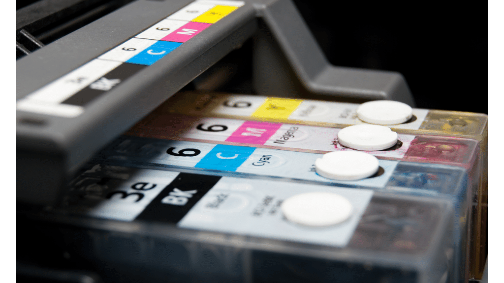 closeup photo of ink cartridges inside a printer