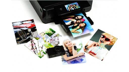 black photo printer with colored photos