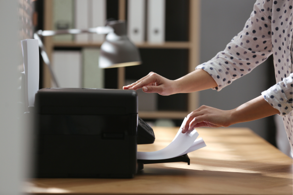 person using inkjet printer